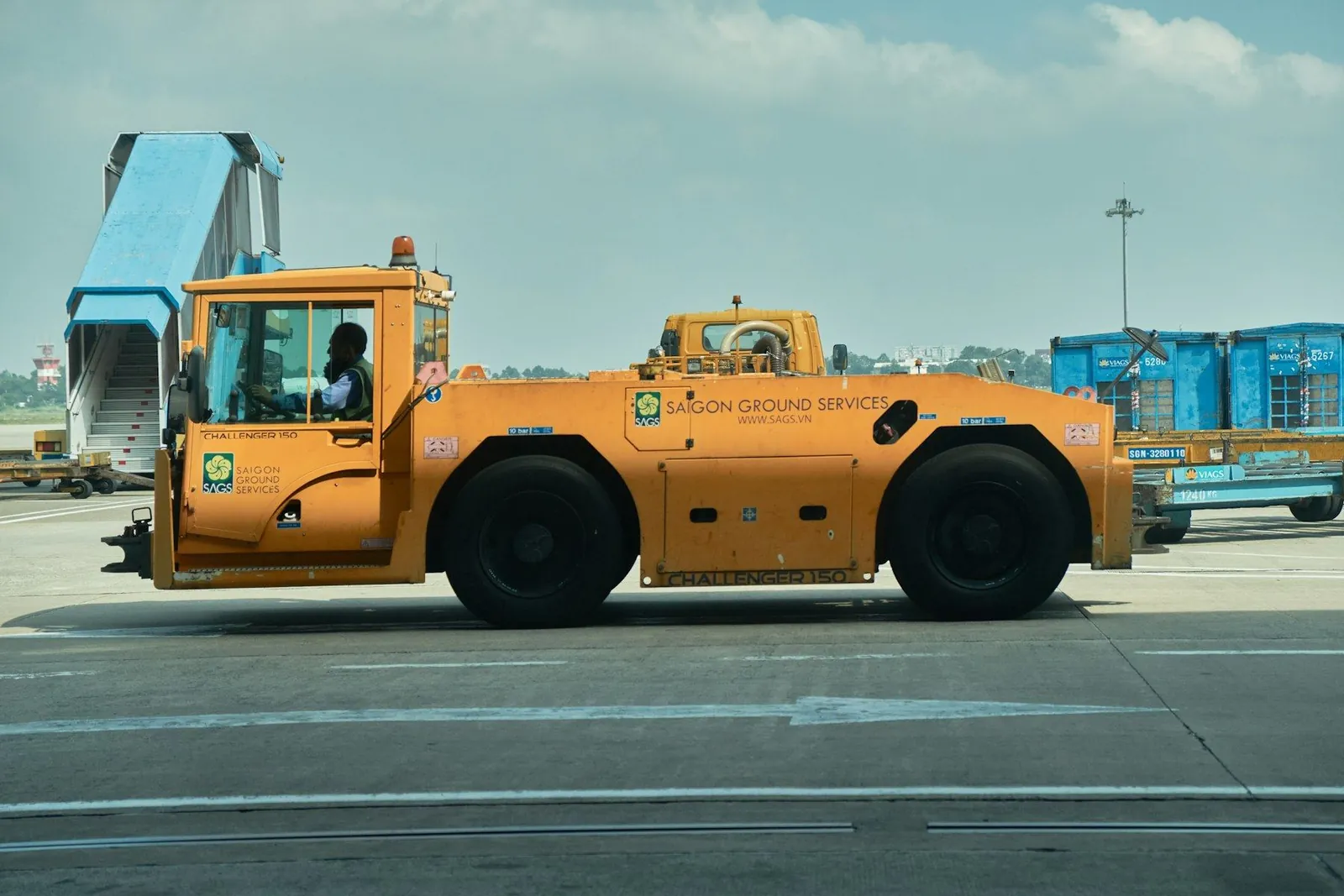 Aircraft towing tractor on the apron