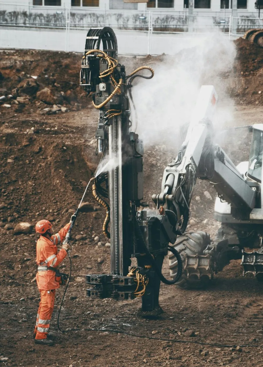 Drill rig with operator on site