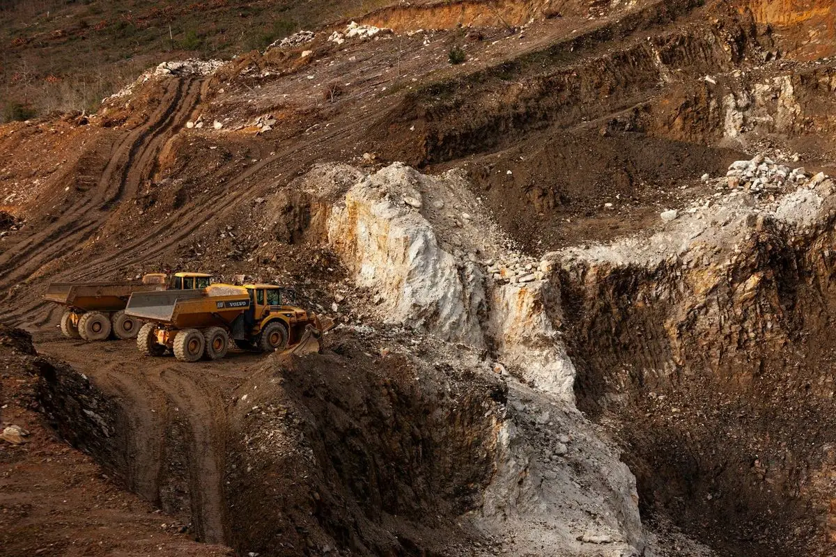 Mining trucks in an open-pit mine